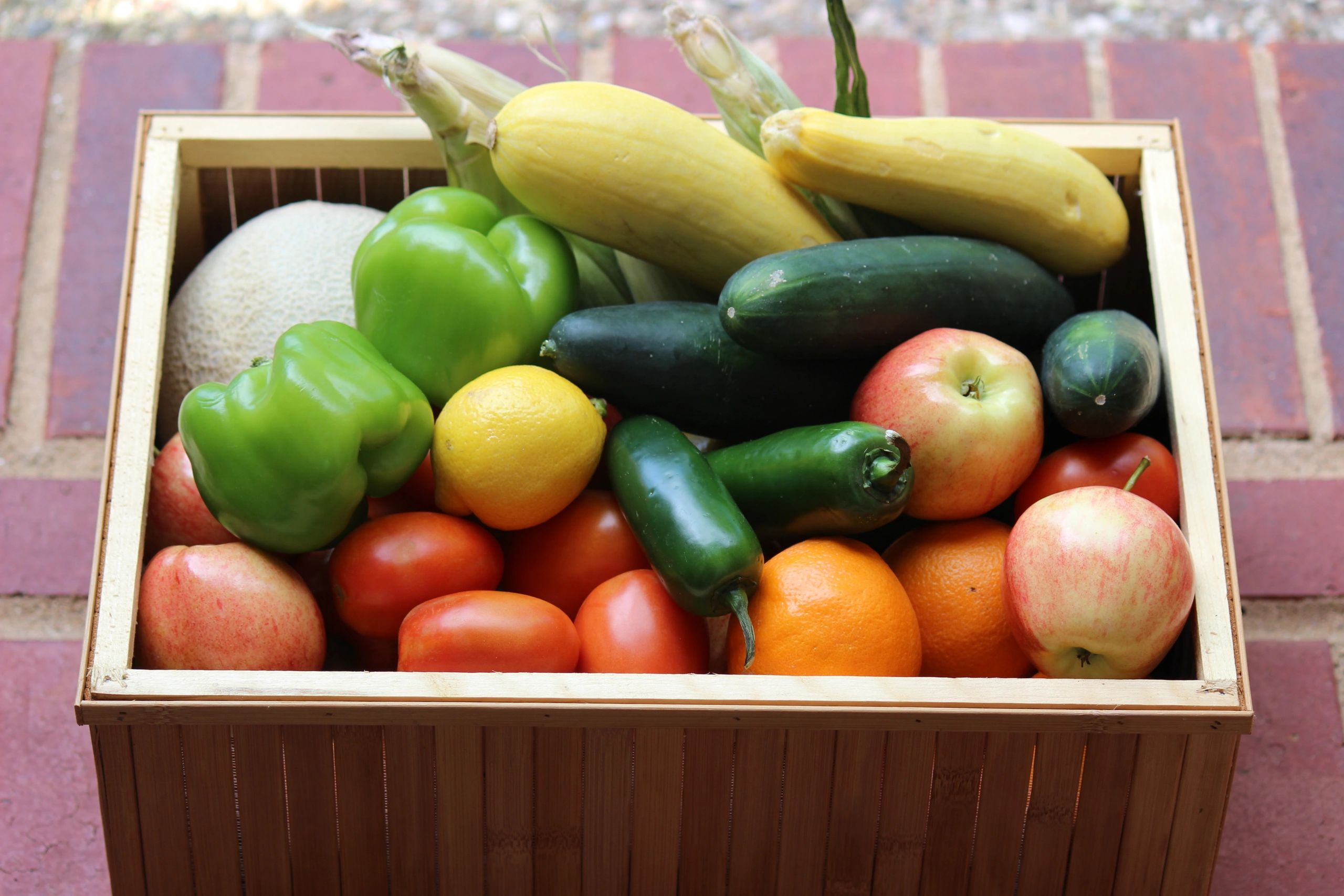 CSA farm box filled with organic vegetables